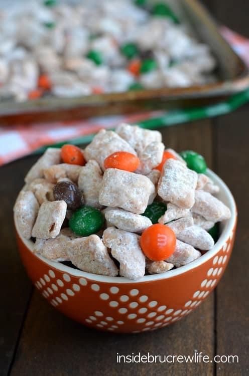 Cinnamon Pumpkin Spice Muddy Buddies - sweet no bake chex mix coated in pumpkin spice chocolate. This easy snack mix is perfect for fall munching!