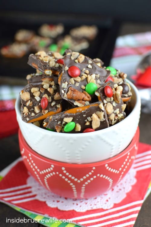 Chocolate covered pretzel bark topped with pecans, toffee, and M&M's is such a fun sweet and salty treat!