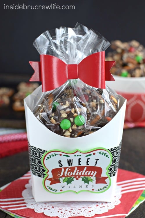 Chocolate covered pretzel bark topped with pecans, toffee, and M&M's is such a fun sweet and salty treat!