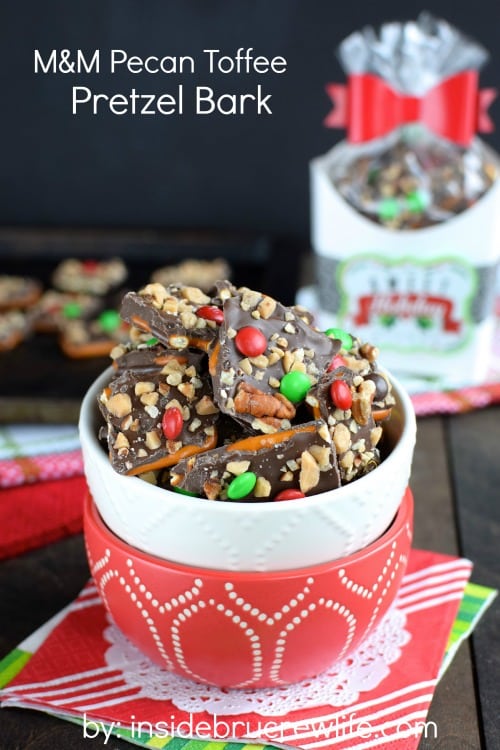 Chocolate covered pretzel bark topped with pecans, toffee, and M&M's is such a fun sweet and salty treat!