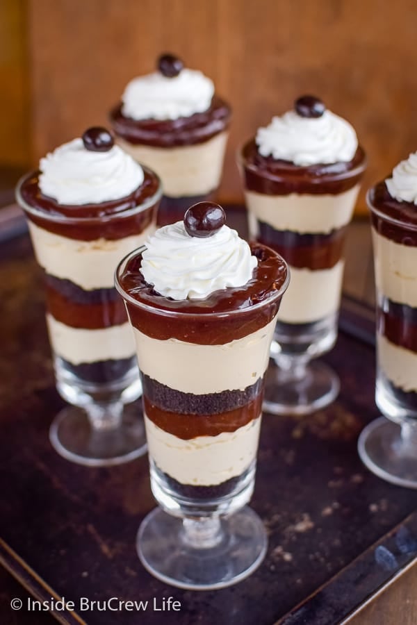 Mocha Fudge Pudding Parfaits - no bake coffee cheesecake, fudge pudding, and cookie crumbs layered in cups makes a decadent and easy dessert. #pudding #parfaits #chocolate #mocha #easy #recipe