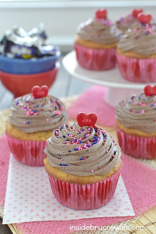 Adding apples to cupcakes and Milky Way candy bars to frosting makes these cupcakes a fun treat!