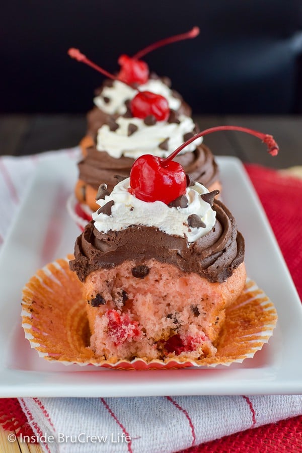 Cherry Chocolate Chip Cupcakes - chocolate chips and cherries add a fun and sweet flair to these easy cake mix cupcakes. Make these bakery style cupcakes for parties this month! #cupcakes #cakemix #doctoredupcakemix #cherry #chocolate