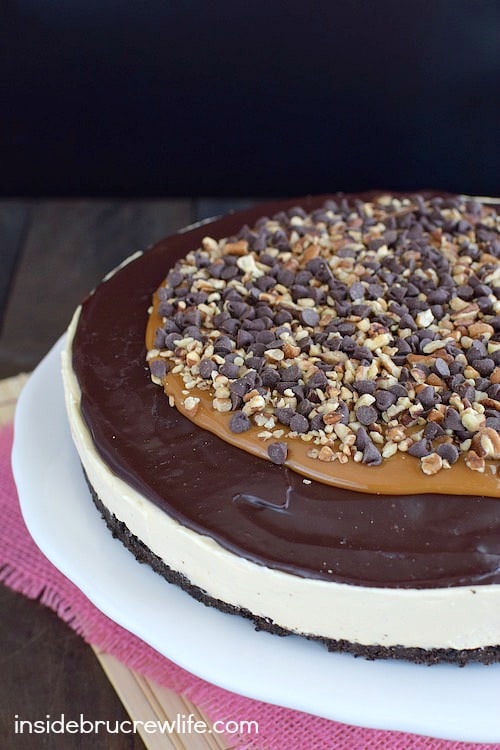 Chocolate Caramel Cheesecake Tart - layers of cheesecake, chocolate, caramel, and nuts will have you reaching for another slice in a hurry. Make this easy recipe right away!