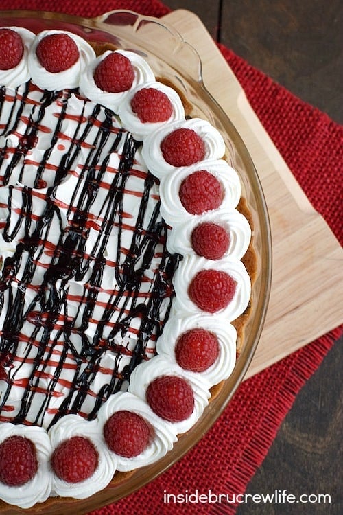 This easy chocolate raspberry cheesecake filling is inside a chocolate chip cookie crust! It is seriously amazing!