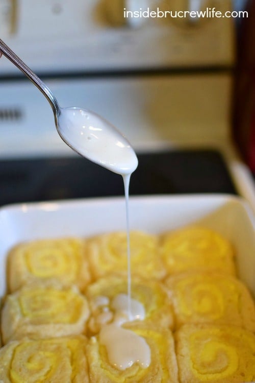 These easy no yeast sweet rolls are filled with lemon cheesecake filling and drizzled with lemon glaze! Perfect breakfast or brunch idea!