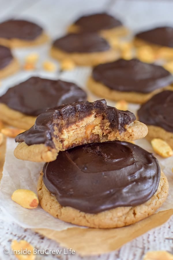 Caramel Peanut Butter Snickers Cookies - cake mix cookies stuffed with candy bars are a sweet treat. Try this fun recipe for dessert.