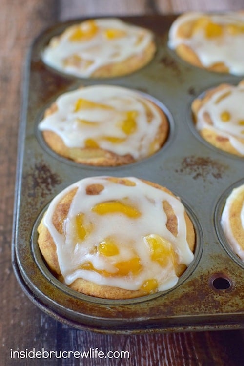  These two-ingredient cinnamon rolls are full of peach pie filling and glaze making a quick and easy breakfast treat.