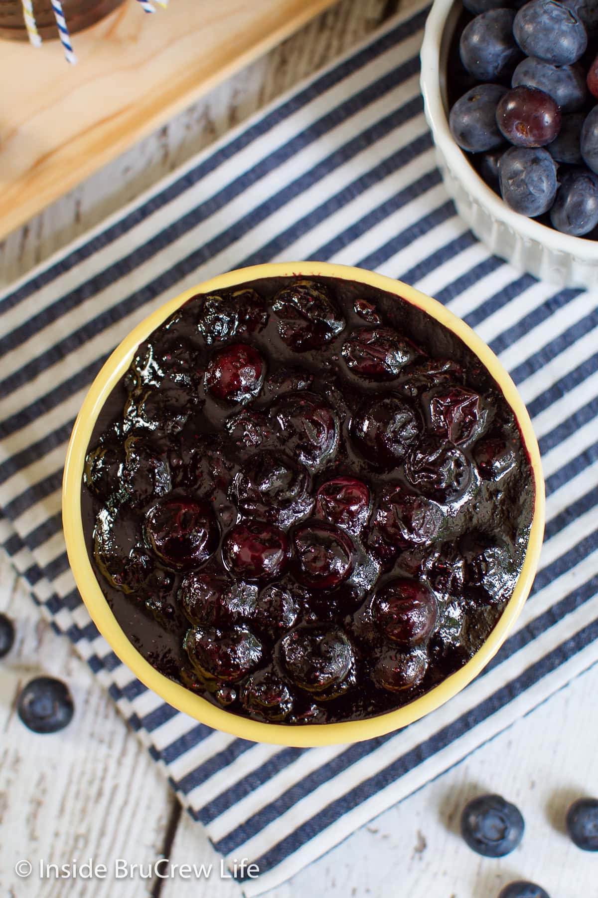 An overhead picture of a bowl of blueberry compote.