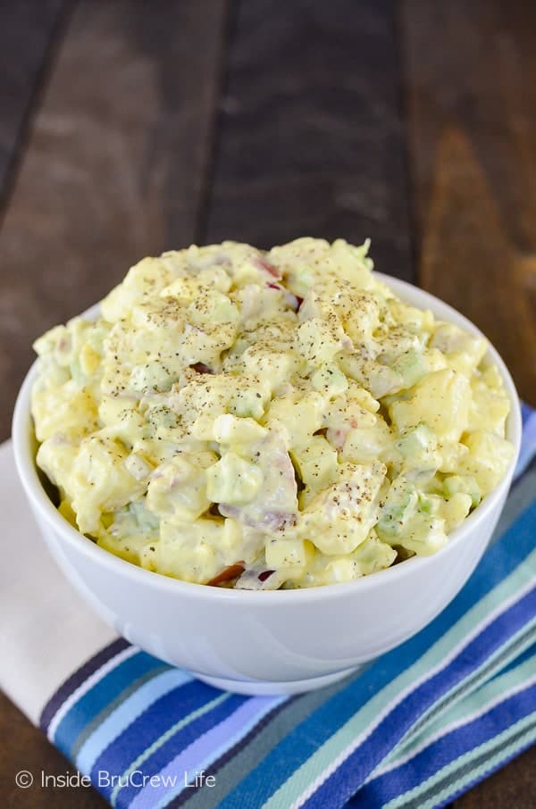 Mom's Potato Salad - this traditional potato salad is loaded with eggs, celery, and pickles just like mom used to make. Make this recipe for all your summer picnics! #salad #picnic #potatosalad #traditional #recipe #summersalads