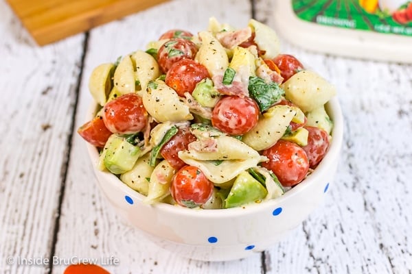 A white bowl filled with creamy Ranch BLT pasta salad