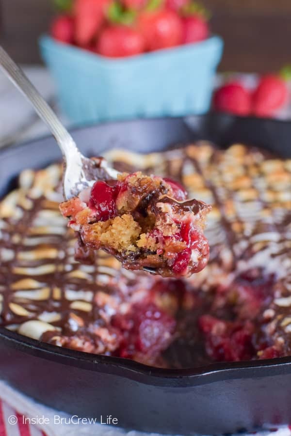 Grab a spoon and get ready to dig into the strawberry s'mores goodness in this skillet cookie!