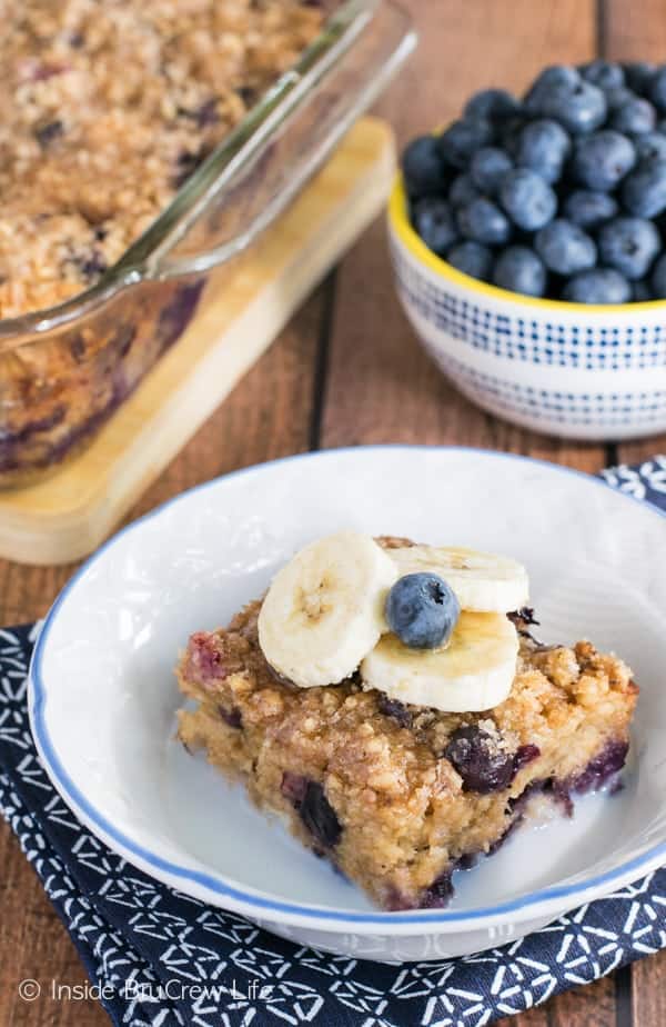 This baked oatmeal has a delicious banana bread flavor with juicy blueberry pops throughout!