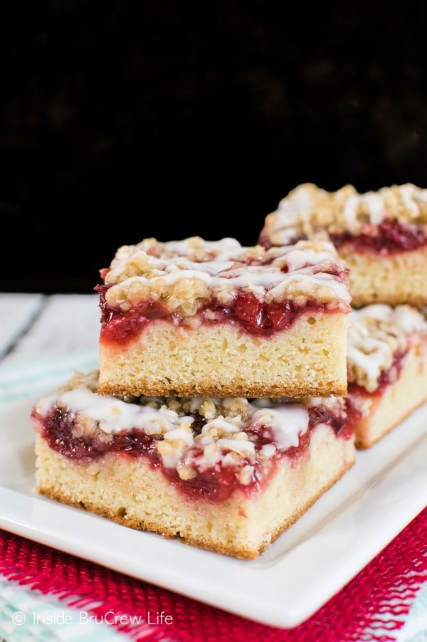 This coffee cake is topped with a crisp topping and cherry pie filling. Perfect cake to have with coffee.