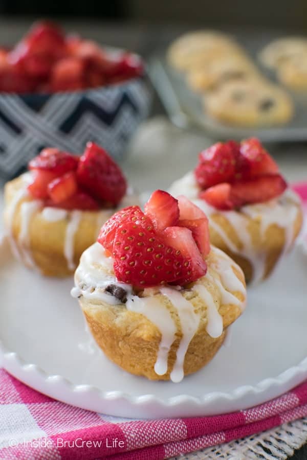 Strawberry cream cheese and chocolate chips add a fun center to these easy muffin rolls. These make the perfect little pastries for breakfast or brunch!