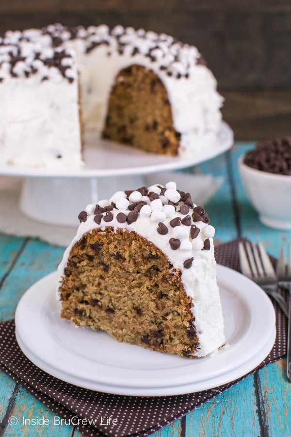Adding graham crackers, marshmallow, and chocolate chips gives this zucchini bundt cake a fun s'mores twist!