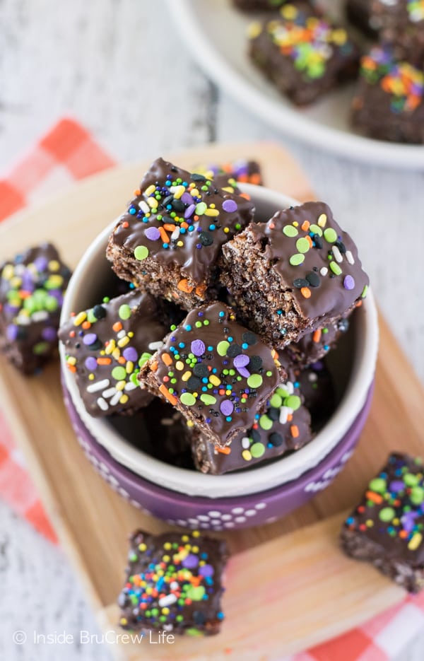 Overhead picture of a white bowl filled with chocolate granola bar bites