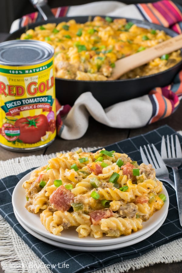This easy pasta dinner is loaded with tomatoes, sausage, and cheese.  It is the perfect dinner for busy nights.