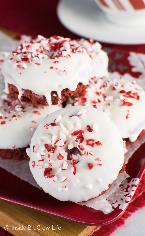 Adding frosting and peppermint pieces makes these easy red velvet donuts a fun holiday breakfast.