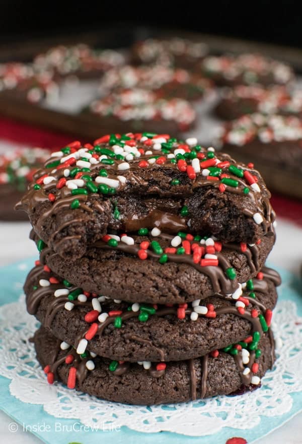 Triple Chocolate Cookies - hiding a chocolate candy bar inside these cookies is a fun surprise. Heat for a few seconds in the microwave to enjoy a hot molten center.