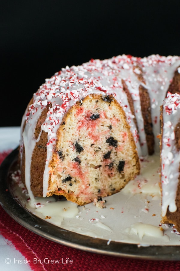 This easy bundt cake is loaded with white chocolate, peppermint pieces, and Oreo cookies. It's a holiday dream dessert!