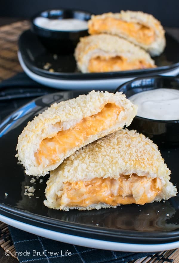 Buffalo Chicken Calzones recipe - these easy biscuits are filled with a buffalo chicken dip. Great dinner or game day appetizer!