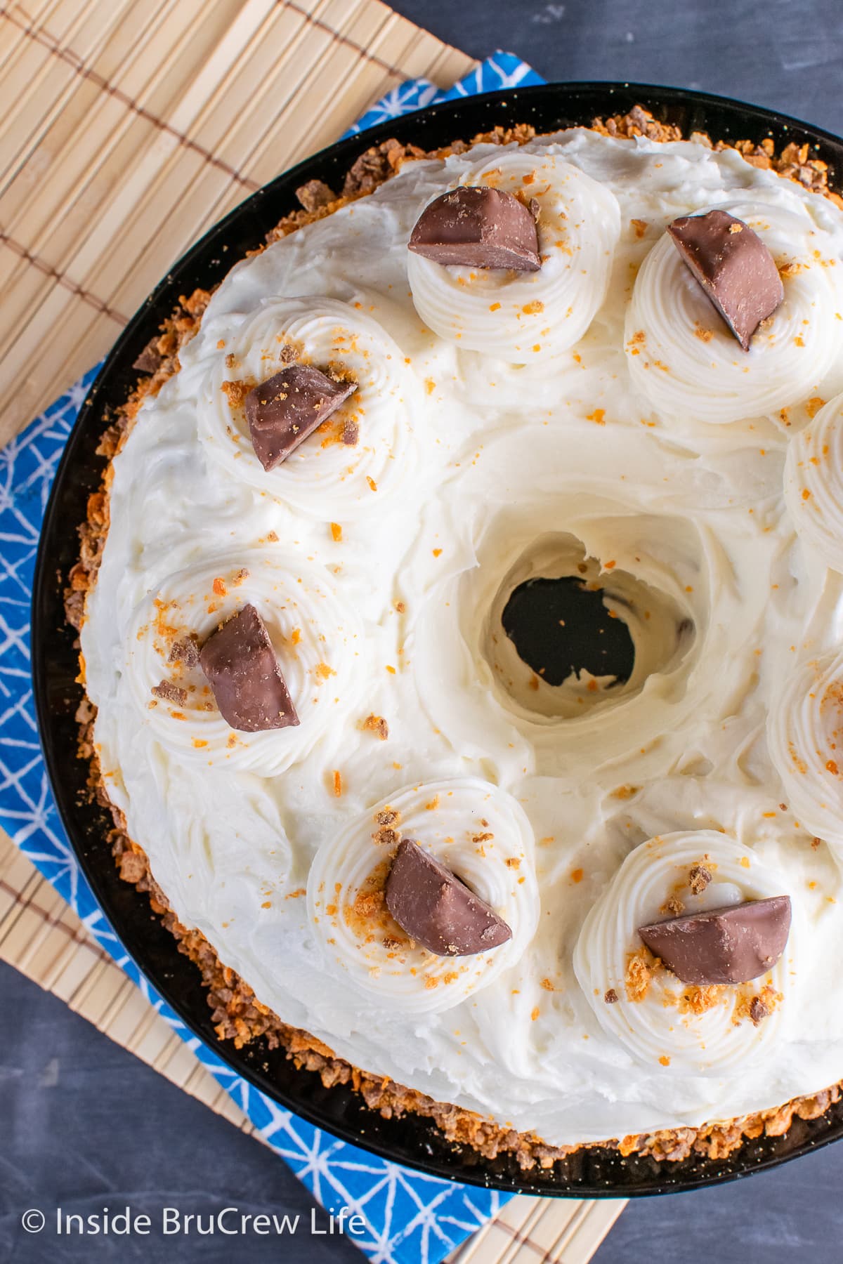 Overhead picture of a frosted bundt cake.