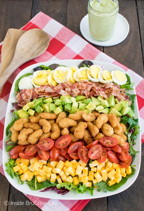 Meat, veggies, and cheese make this Avocado Shrimp Cobb Salad a great dinner choice for healthy eating.