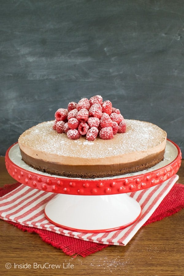 This fun Raspberry Nutella Brownie Cake has three layers of chocolate and fresh raspberries. Easy dessert recipe.