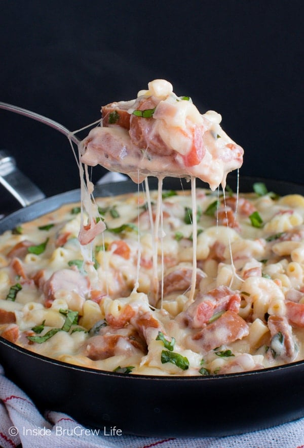 This Tomato Basil Sausage Skillet is loaded with meat, cheese, and tomatoes. Great dinner recipe for busy nights.