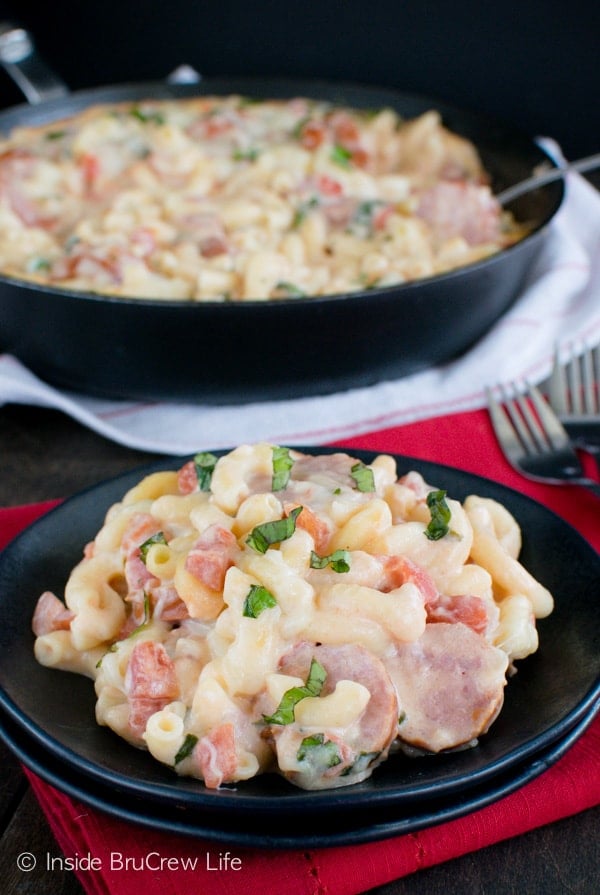 Tomato Basil Sausage Skillet - cheesy pasta dinner that can be ready in under 30 minutes. Great dinner recipe for busy nights.