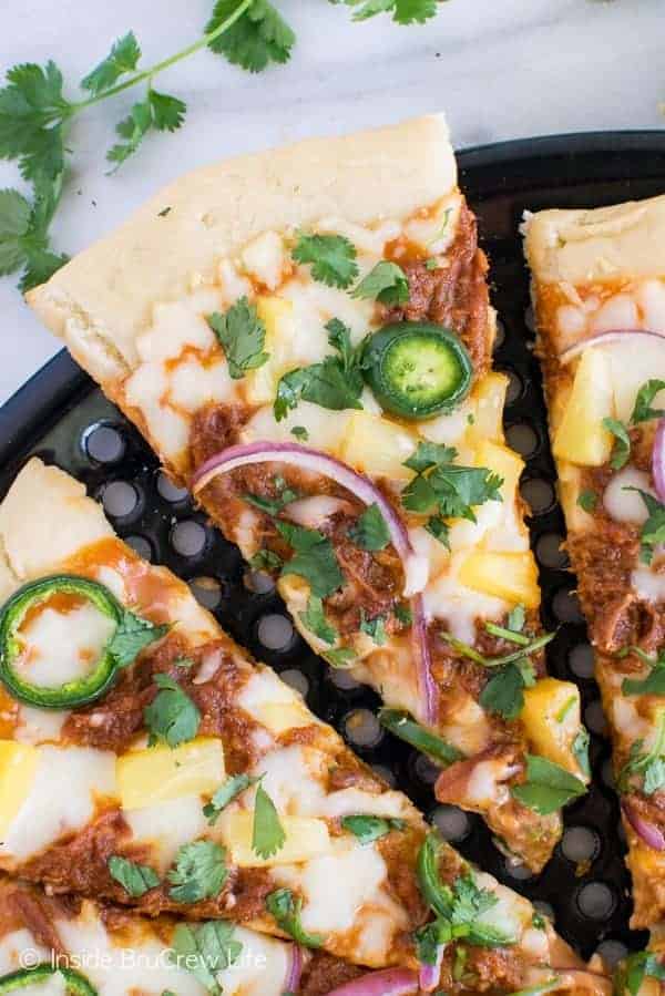 BBQ Pork Pineapple Pizza - this easy grilled pizza has a sweet and spicy combo that will have you reaching for more. Great summer dinner recipe! #99DaysofBBQ #sponsored