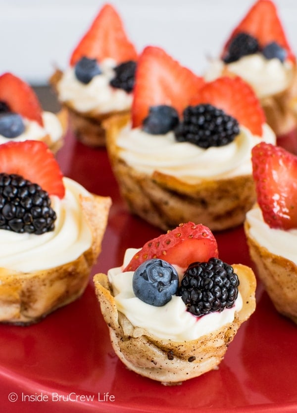 Fresh berries and a lemon no bake cheesecake makes these Lemon Mousse Dessert Cups a fun summer treat.