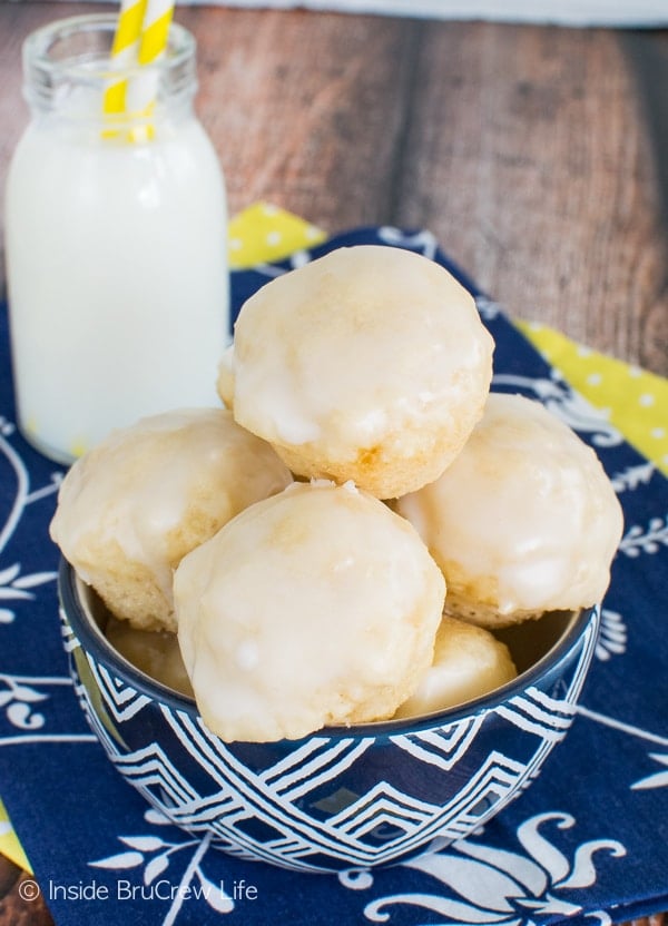 Lemon glaze on these Mini Lemon Donut Muffins makes them disappear in a hurry. Awesome little breakfast recipe!