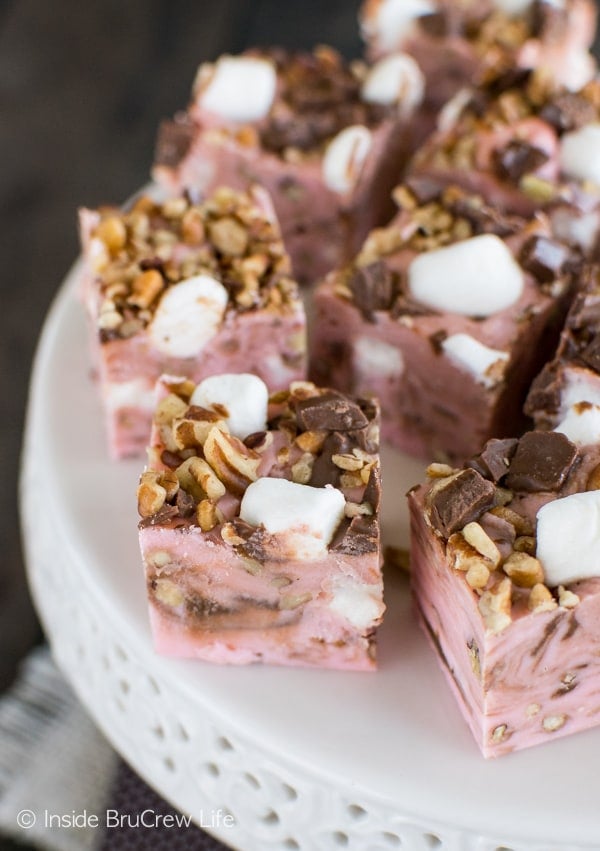 Pecans, marshmallows, and chocolate chunks make this Strawberry Rocky Road Fudge disappear in a hurry. Awesome no bake dessert recipe!