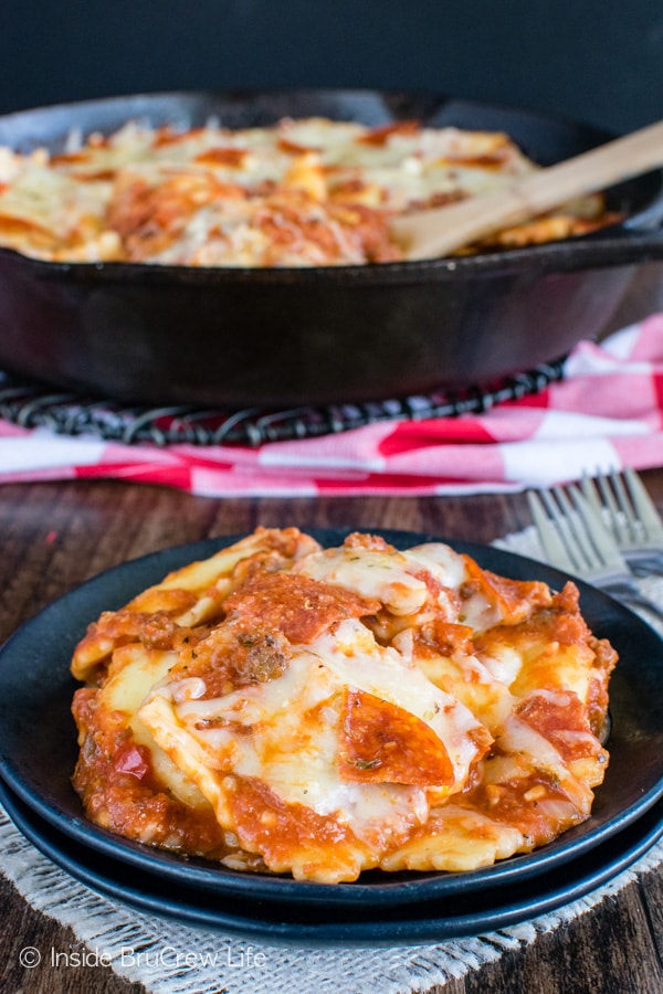 Meat Lover's Pizza Skillet Ravioli - three kinds of meat and lots of gooey cheese make this dinner a hit with everyone. Quick and easy recipe for busy nights!