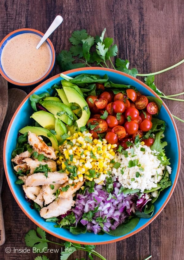 Mexican Street Corn Chicken Salad - all the flavors of the grilled corn in a giant salad bowl with chili ranch dressing! Great healthy meal recipe!