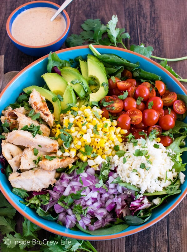 Grilled corn, cheese, chicken, and chili lime ranch dressing makes this Mexican Street Corn Chicken Salad a hit at dinner! Great healthy meal recipe!