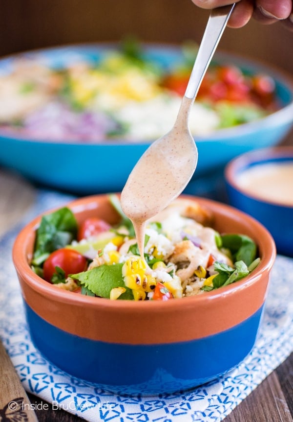 Mexican Street Corn Chicken Salad - chili lime ranch dressing drizzled over corn, cheese, chicken, and greens is a great way to do dinner! Awesome recipe!