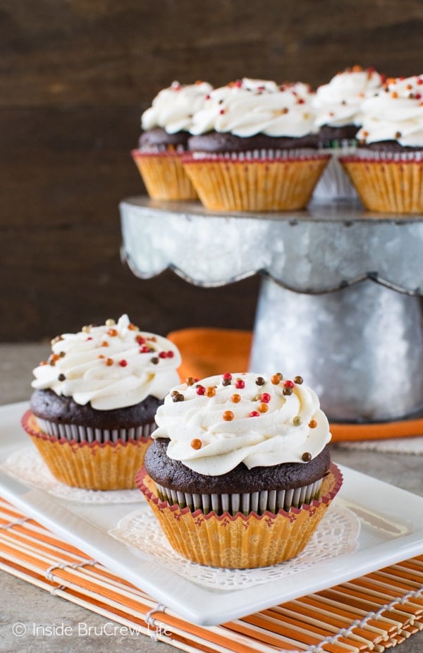 The hidden pumpkin cream center makes these Chocolate Pumpkin Cream Filled Cupcakes a fun fall recipe!