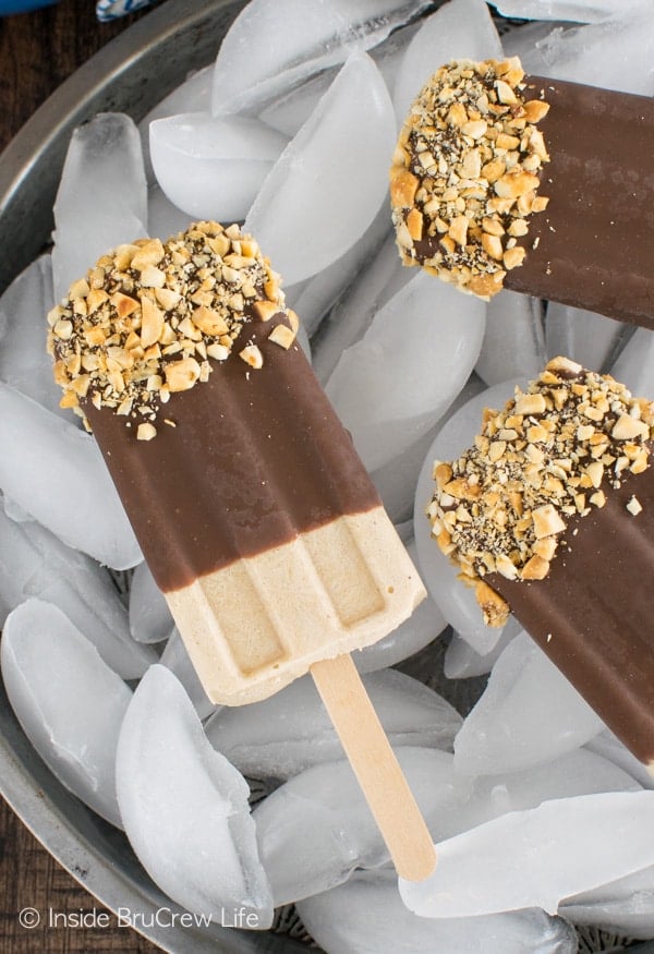 Chocolate dipped Peanut Butter Banana Popsicles are a fun recipe to eat as an after school snack or dessert!