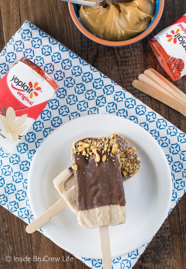 These fun Peanut Butter Banana Popsicles are loaded with yogurt, peanut butter, and banana. Great after school snack or dessert recipe!