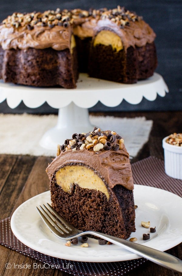 Chocolate Pumpkin Cheesecake Bundt Cake - a hidden cheesecake center and creamy frosting makes this fun fall cake disappear in a hurry!