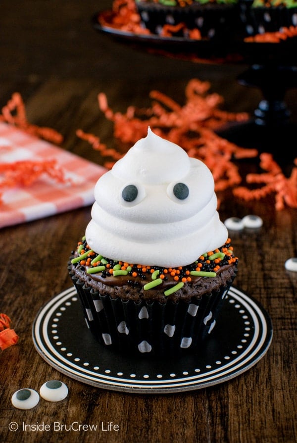 These little Ghost Brownie Cupcakes are a fun and easy Halloween treat. The hidden cookie in the bottom will surprise everyone!