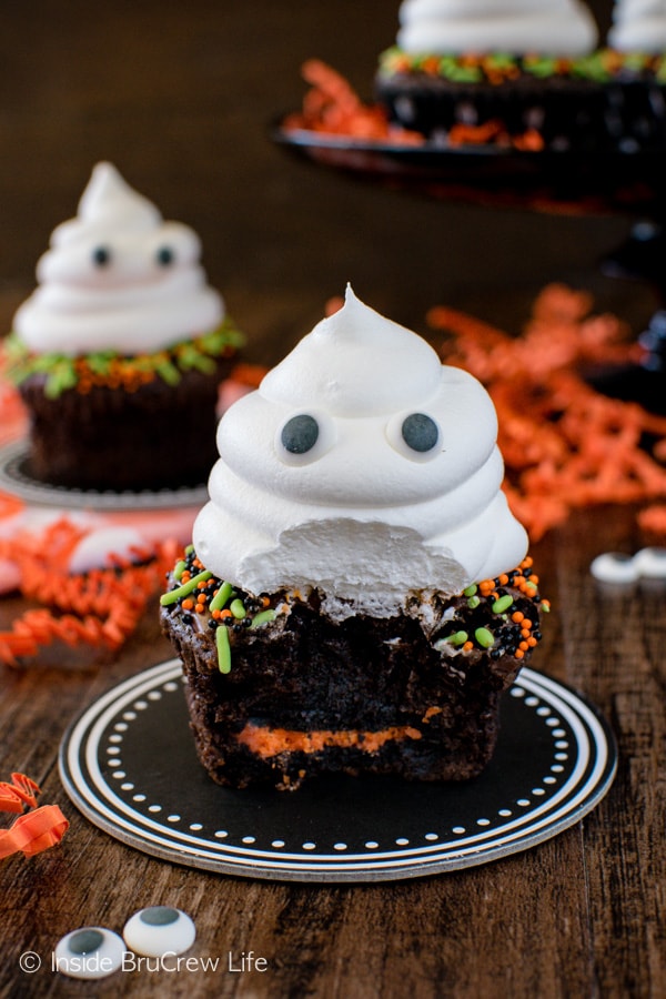 A hidden Oreo cookie and a friendly ghost on top makes these Ghost Brownie Cupcakes a fun Halloween treat!