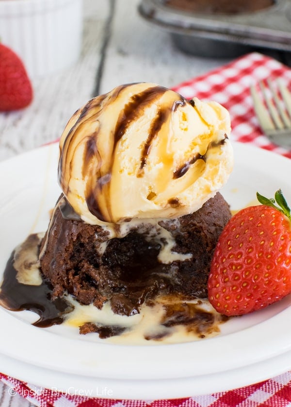 Chocolate Lava Cakes - the gooey chocolate center topped with ice cream and toppings will have you licking your plate clean. Awesome dessert recipe!