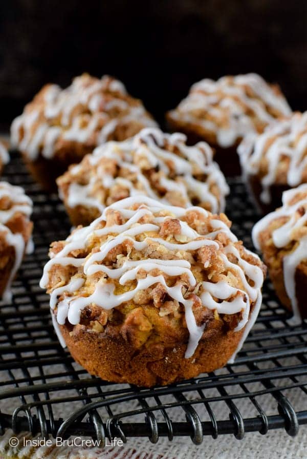 Pumpkin Banana Streusel Muffins - soft muffins with a crunchy topping and sweet glaze make the perfect fall breakfast. Great recipe to use up those ripe bananas.