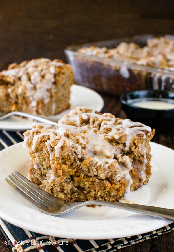 Banana Caramel Coffee Cake - layers of banana cake, caramel cheesecake, crumbs, & glaze will have you going back of another piece. Great breakfast or dessert recipe!