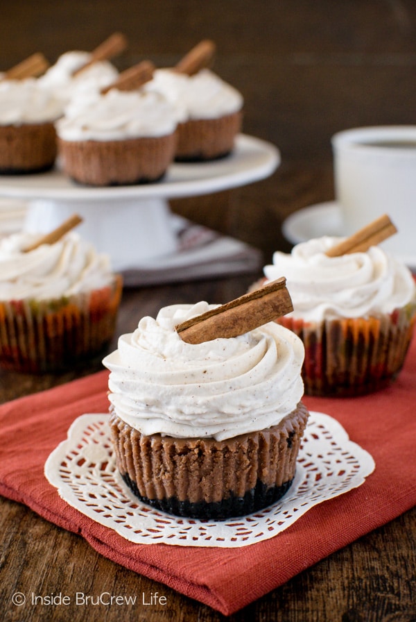 Chocolate Chai Cheesecakes - creamy chocolate cheesecake cupcakes and a homemade spiced topping makes these cheesecake cupcakes a great dessert to add to fall tables!