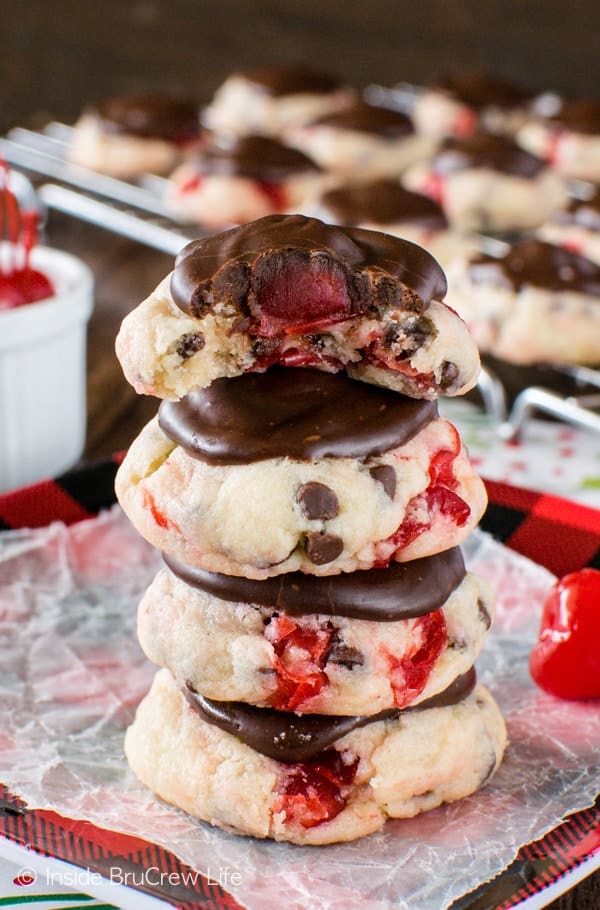 Chocolate Chip Cherry Cookies - these easy cookies are packed with chocolate and cherry pieces. Another cherry & more chocolate on top adds a fun surprise to this holiday cookie recipe!